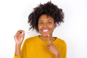 woman smiling with Invisalign