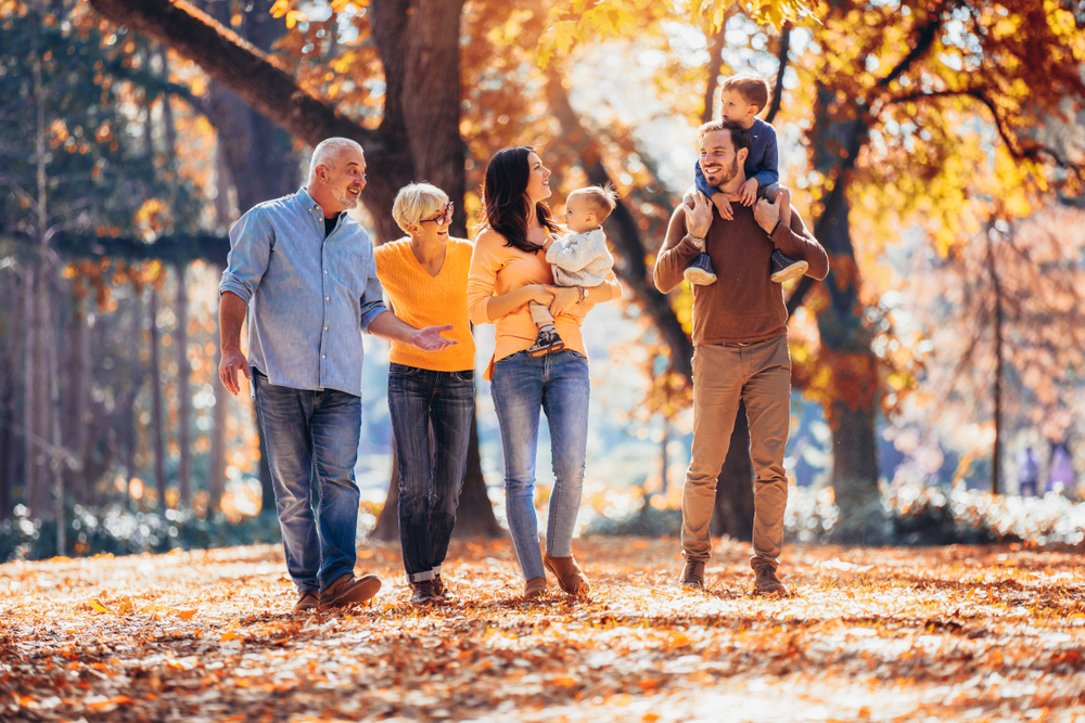 family enjoys the fall season