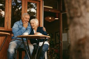 older couple out at a cafe